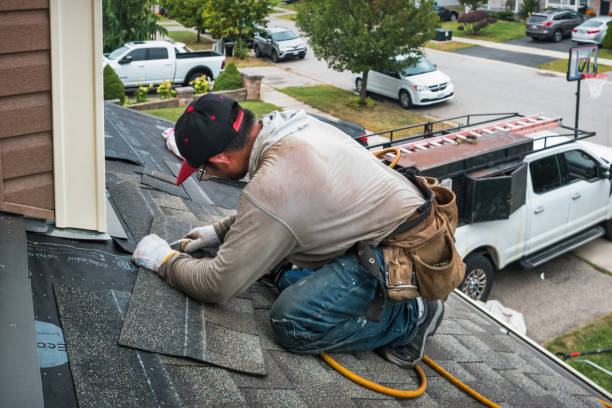 Professional Gutter Repair And Installation technician working in Wharton, TX